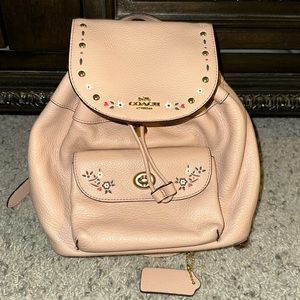Mauve and Floral Coach Backpack